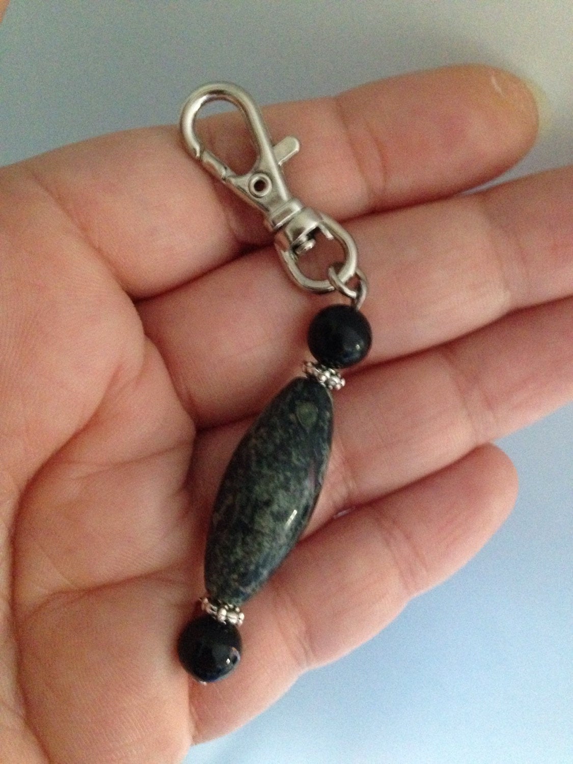 STONE KEYCHAIN with black onyx and kambaba jasper stones as a keychain or purse charm in hand