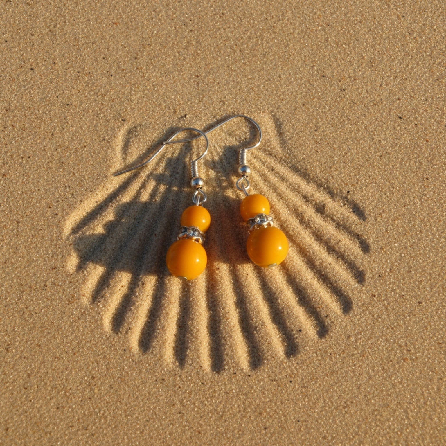 Orange beaded earrings  with rhinestones