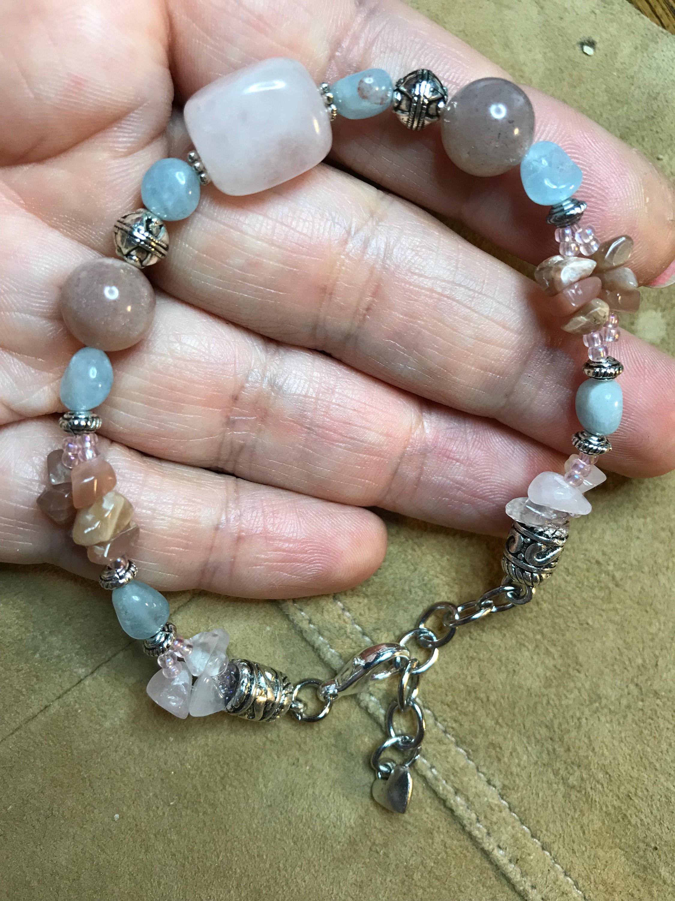 Genuine aquamarine, rose quartz, and peach moonstone natural stone ladies bracelet with silver accents