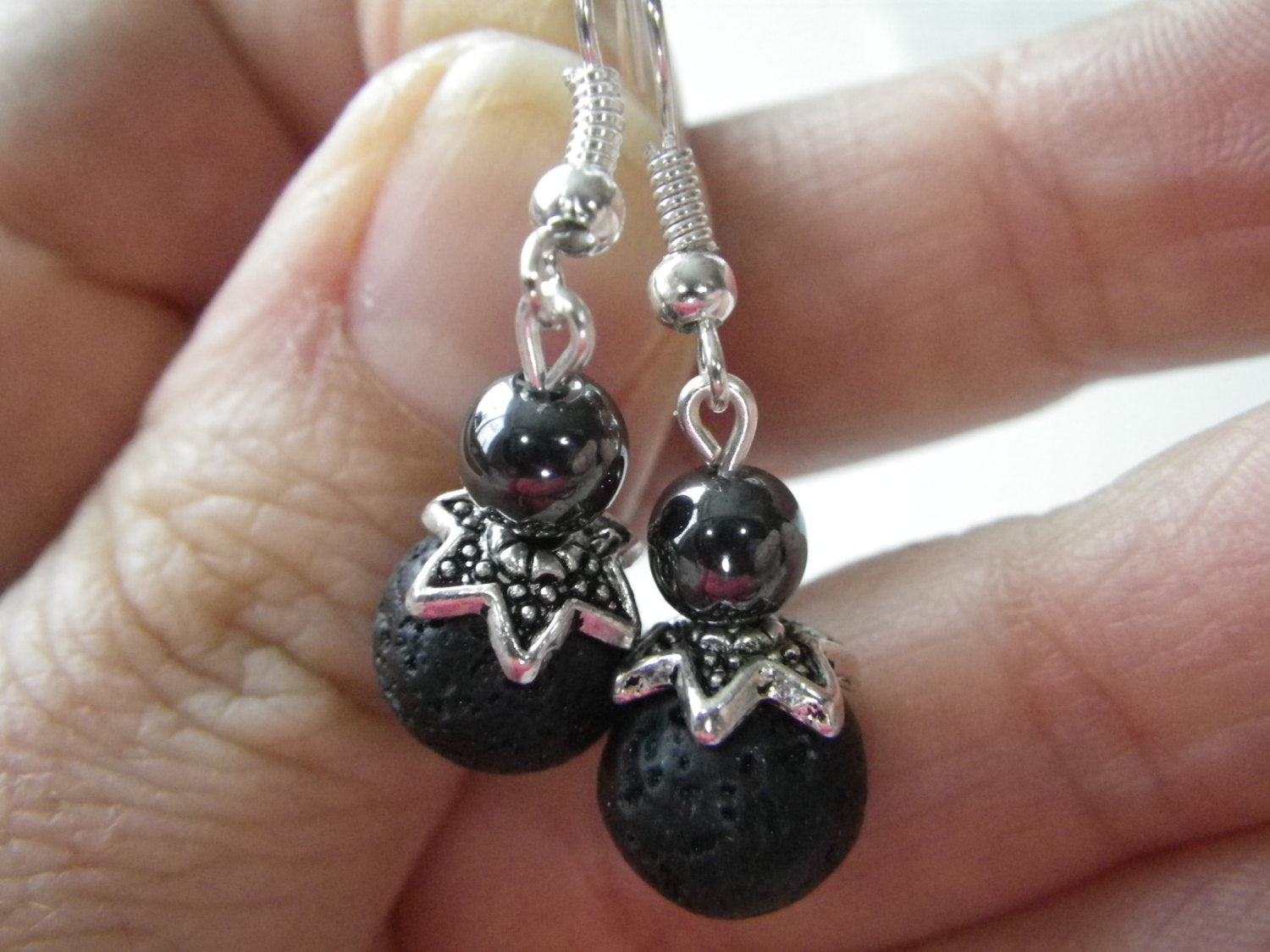 Womens earrings made with hematite and black lava stone natural stones, lightweight and elegant design.