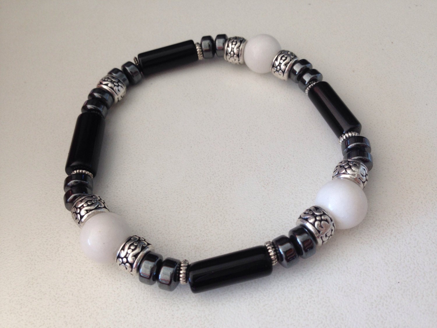 Men's bracelet with White Dolomite, Hematite, and Black Onyx beads