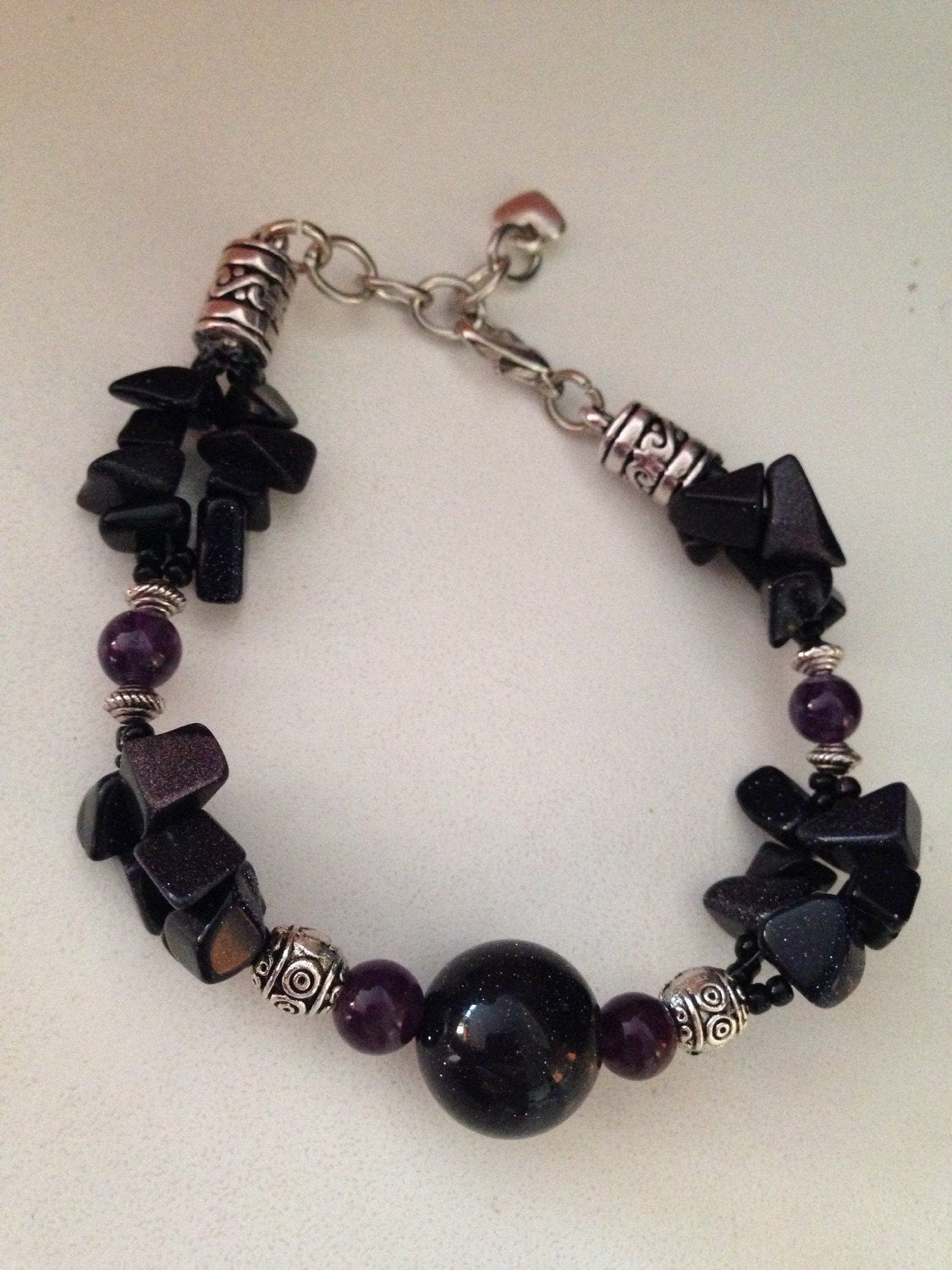 Women's bracelet in Blue Goldstone and Amethyst (B107) with a heart charm, stone bracelet, stone jewelry