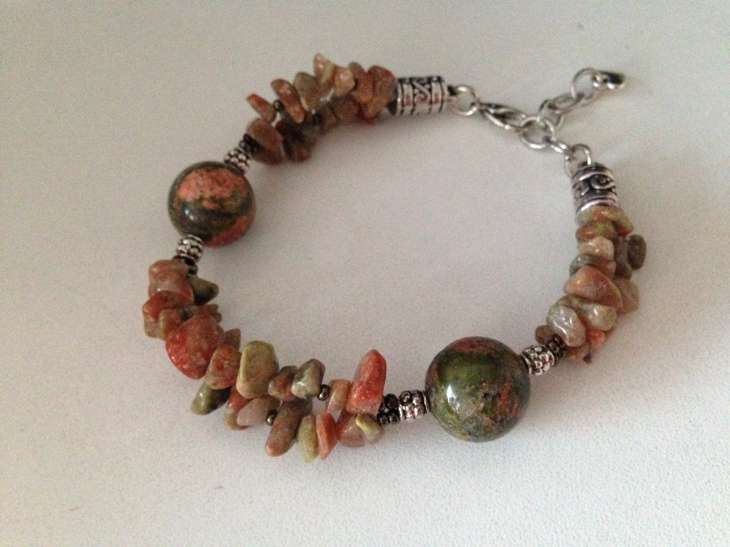 Ladies bracelet with Unakite and autumn jasper stones and heart charm on adjustable band